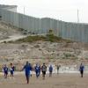 Die Mauer an der Grenze zu Ostjerusalem steht für den Konflikt zwischen Israelis und Palästinensern. 