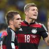 Toni Kroos und Philipp Lahm haben es neben Manuel Neuer als deutsche WM-Helden in die UEFA-Elf 2014 geschafft.