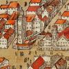 Das gotische Rathaus und der Perlachturm sind wirklichkeitsgetreu in Miniatur auf dem Holzschnitt wiedergegeben.