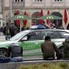 Polizisten haben bei einem Ausflug nach Augsburg am Königsplatz einen Asylbewerber attackiert. Nun wird der Fall vor Gericht neu aufgerollt.