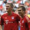 Die Spieler des FC Bayern, Bastian Schweinsteiger und Philipp Lahm freuen sich aufs Finale dahoam. Für eine einzigartige Stimmung soll die Kampagne "Mia san rot-weiß" sorgen. Ganz München soll in Rot und Weiß gehüllt werden.