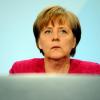 Bundeskanzlerin Angela Merkel: Weniger Menschen als früher sind mit ihrer Arbeit zufrieden.  dpa
