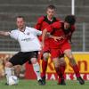 Der BC Aichach (weiß) kam in Würzburg zu eiem 1:1 - das aber nciht zum Aufstieg reichte. 