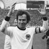 Abwehrspieler und Kapitän Franz Beckenbauer bejubelte den erkämpften Weltmeistertitel vor 80.000 Zuschauern im Münchner Olympiastadion. 