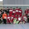 Sieger und Zweitplatzierte beim Hallenfußballturnier der JFG Region Burgheim in der Altersklasse der U15: In schwarzen Trikots das Team der Gastgeber, das sich im Endspiel dem FC Rennertshofen (in Rot) denkbar knapp mit 6:7 nach Neunmeterschießen geschlagen geben musste.  
