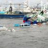Riesenwellen haben heute Morgen Teile Japans verwüstet. Bild: afp