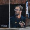„Wir sind Liverpool. Das bedeutet mehr.“ Jürgen Klopp hat es in Liverpool in die Herzen der Menschen und auf diese Hausfassade geschafft.