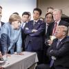 Beim G7-Gipfel redet Angela Merkel auf Donald Trump ein. 