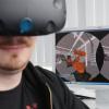 In einer virtuellen Werkshalle von Kuka kann man lernen, Roboter zu bauen. Student Jörg Rauscher zeigt, wie es geht.