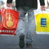 Die Supermarktketten Kaiser's Tengelmann und Edeka klagen gegen das Bundeskartellamt.