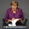 Die fehlende Kanzlermehrheit bei der Griechenland-Abstimmung ist nicht das Ende der Koalition. Merkel ist hart im Nehmen und muss den Euro retten. Mit der FDP hat sie aber noch eine Rechnung offen. Foto: Hannibal dpa