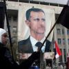 Das Bild von Präsident Assad bei einer Veranstaltung von Anhängern des Regimes in Damaskus. Foto: Youssef Badawi dpa