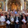 Der Liederchor Aichach wird 100 Jahre alt. Das Bild zeigt ihn in der Kirche St. Emmeran in Unterschneitbach.  	