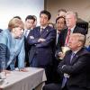 G7-Teilnehmer im Gespräch mit US-Präsident Donald Trump.