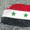 Die syrische Nationalflagge vor wenigen Tagen im Schneegestöber – ein Sinnbild für die eiskalten politischen Verhältnisse, die derzeit in dem Land herrschen.  