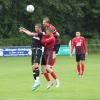 Den Höhenflug des TSV Wertingen konnte auch der TSV Meitingen nicht stoppen. Hier verliert Kapitän Arthur Fichtner (dunkles Trikot) das Kopfballduell gegen die beiden Gästespieler Maximilian Beham und Andreas Kotter. Lukas Erhard (links) und Florian Heiß beobachten den Luft-Dreikampf. Foto: Karin Tautz