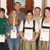 Zahlreiche Ehrungen gab es bei Alpenrose Grimolzhausen: (vorne, von links) Zweiter Vorsitzender Karl-Heinz Riepold, Manuela Schlicker, Gauschützenmeister Alois Helfer, Petra Schleger, Stefan Zech, Peter Brunninger, Simon Neff, Verena Schleger, Alexander Wenger, Birgit Bayr, Robert Wenger, Rita Sigl, Peter Schlicker, Thomas Kupferschmid, Erster Vorsitzender Jörg Zech. 	