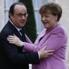 Francois Hollande und Angela Merkel mahnen eine europäische Lösung der Flüchtlingskrise an.