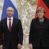 Der russische Präsident Putin (l-r), Kanzlerin Merkel, der französische Präsident Hollande und der ukrainische Präsident Poroschenko treffen sich in Berlin.