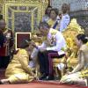 Thailands König Maha Vajiralongkorn (Mitte), und Königin Suthida (rechts) bei der Krönungszeremonie für den König im Mai 2019.