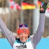 Die deutsche Athletin Andrea Eskau jubelt über ihren Sieg.