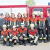 Zehn Feuerwehrleute unterzogen sich in Asch einer Leistungsprüfung, auf dem Foto zusammen mit den Kommandanten und Schiedsrichtern.  
