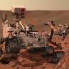  Der Mars-Rover "Curiosity" tastet auf einer Computerillustration Mars-Gestein mit einem Laserstrahl ab.