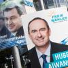 Hubert Aiwanger (rechts) von den Freien Wählern und Ministerpräsident Markus Söder von der CSU auf ihren Wahlplakaten.