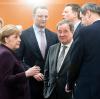 Bundeskanzlerin Angela Merkel, NRW-Ministerpräsident Armin Laschet (Mitte) und Bayerns Regierungschef Markus Söder (rechts)  beim Bund-Länder-Treffen.