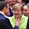 Bundeskanzlerin Angela Merkel, der französische Präsident Emmanuel Macron und die britische Premierministerin Theresa May unterhalten sich auf dem EU-Gipfel.