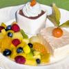 Hier finden Sie ein besonders leckeres Rezept für Mango-Joghurt-Parfait mit Obstsalat.