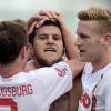 Nächster Halt Europa? Paul Verhaegh, Raul Bobadilla und Andre Hahn freuen sich über den Sieg in Braunschweig, der die Möglichkeit am Leben erhält, nächste Saison in der Europa League zu spielen.