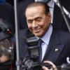 Grinst da der zukünftige Staatspräsident Silvio Berlusconi? 	