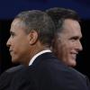 US-Präsidnet Barack Obama (l) und Herausforderer Mitt Romney (r) schütteln sich nach ihrer letzten TV-Debatte die Hände. Foto: Jim Lo Scalzo dpa