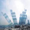 An der Stelle, an der früher einmal das World Trade Center in New York stand, stieg nach dem Terroranschlag vom 11. September 2001 hinter Fassadenresten Rauch auf.