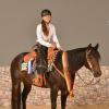 Überglücklich über ihren deutschen Titel: die 19-jährige Milena Guggenmos aus Pfaffenhofen, die mit ihrem Pferd OW Reds Maximus die deutsche Jugendmeisterschaft in der Westernreitdisziplin Ranch Riding gewann. 	
