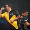 Gabriel Clemens (links) gewann gegen Gerwyn Price sensationell mit 5:1.