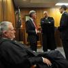 Oscar Pistorius (r) mit seinem Verteidigerteam im Gerichtssaal in Pretoria: Barry Roux (v.l.), Brian Webber und Kenny Oldwage.