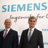 "Ingenuity for life" lautet der neue Siemens-Slogan. Der Vorstandsvorsitzende der Siemens AG, Joe Kaeser (rechts) und Finanzvorstand Ralf P. Thomas hoben ihre Gewinnprognose an. 