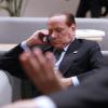 Italiens Regierungschef Silvio Berlusconi vor Beginn des EU-Gipfels in der Lobby.