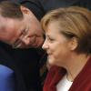 Die Große Koalition will eigentlich niemand: Bundeskanzlerin Angela Merkel (CDU) 2006 im Bundestag in Berlin mit dem damaligen Bundesfinanzminister Peer Steinbrück (SPD). 