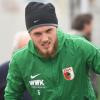 Statt im Orange der niederländischen Nationalmannschaft läuft Jeffrey Gouweleeuw weiterhin im Grün des FC Augsburg auf.