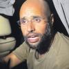 Plötzlich taucht der angeblich gefangen genommene Gaddafi-Sohn Saif al-Islam in der Nacht zu Dienstag mitten in Tripolis auf, spricht zu Journalisten, begrüßt seine Anhänger und verkündet: „Wir werden gewinnen!“ 