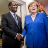 Die Kanzlerin mit dem Amtskollegen Ouattara von der Elfenbeinküste.   