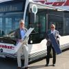 Wirtschaftsingenieur Thomas Schmidt und der Geschäftsführer der Firma Probst Bus GmbH & Co. KG Franz E. Zenker (rechts) stellen neue Entkeimungsmodule vor, die in Linienbussen verbaut werden.  	