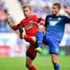 Hoffenheims Andrej Kramaric (r) und Hertha-Profi Fabian Lustenberger beim Zweikampf.