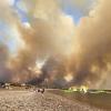 Ferieninsel Rhodos in Flammen: Touristen fliehen aus der Feuerhölle