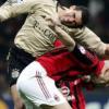 Dutch defender Jaap Stam (R) of AC Milan (R) and Lucio of Bayern Munich struggle for the ball during their Champions League first knockout round second leg soccer match in Milan's San Siro Giuseppe Meazza stadium late Wednesday 08 March 2006. EPA/MATTEO BAZZI +++(c) dpa - Bildfunk+++