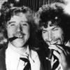 Eine Zigarre auf den WM-Titel: Auf dem Abschiedsbankett der Fifa rauchen die Weltmeister Gerd Müller (links) und Paul Breitner lachend eine Zigarre. 