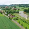 Das Rückhaltebecken südlich von Langenneufnach war am Sonntagmorgen gegen 6.30 Uhr noch randvoll. In der Nacht mussten Wassermassen abgelassen werden.